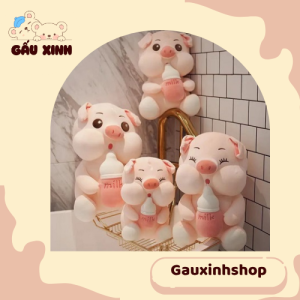 Gấu bông heo ôm bình sữa